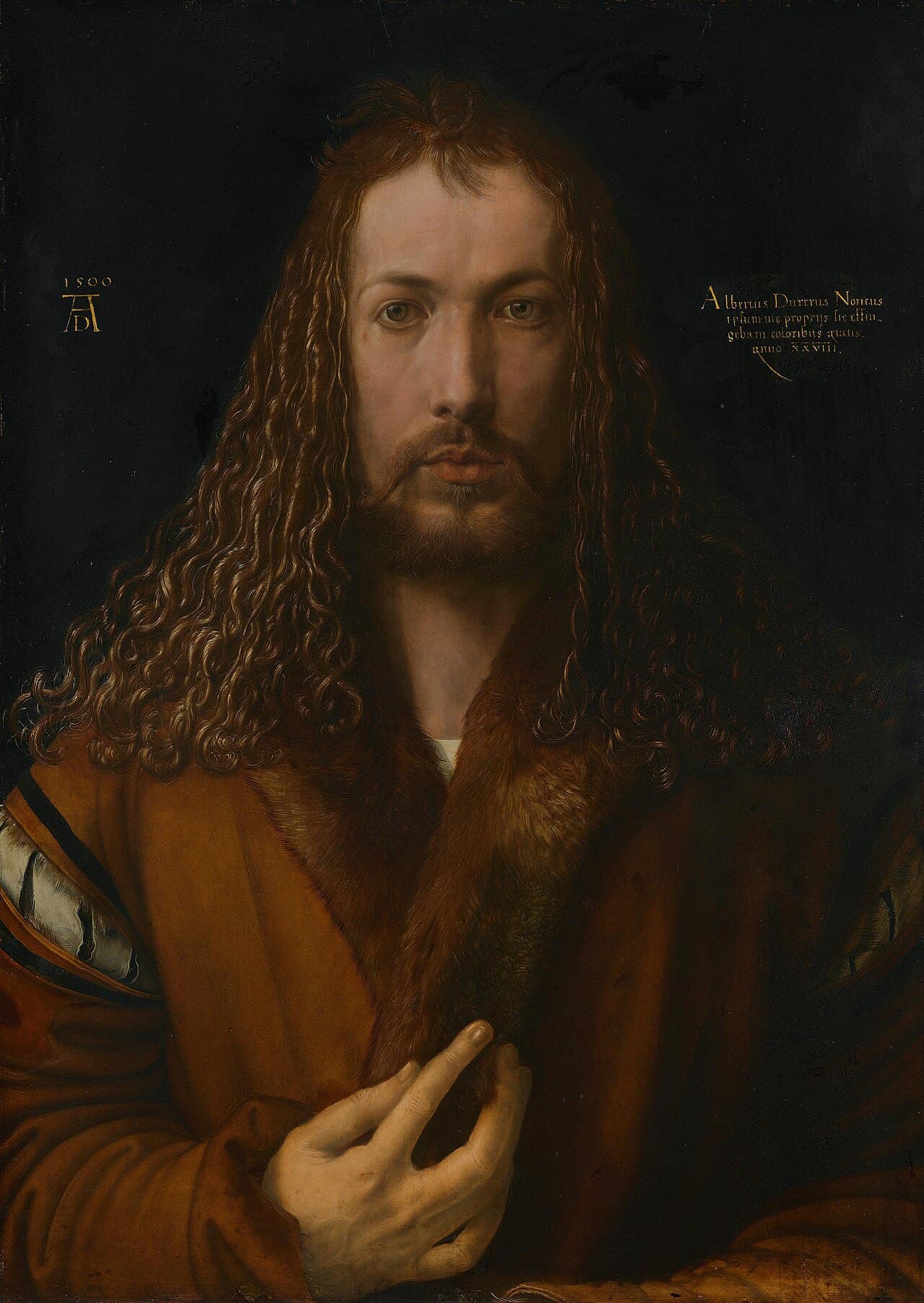 Albrecht Dürer's 1500 Self-Portrait in a Fur-Collared Robe, frontal pose with a blessing hand