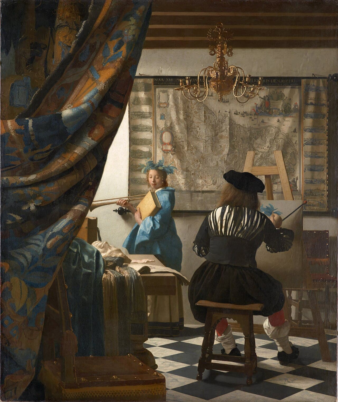 Johannes Vermeer's The Art of Painting, showing a painter at his easel with a model dressed as Clio.