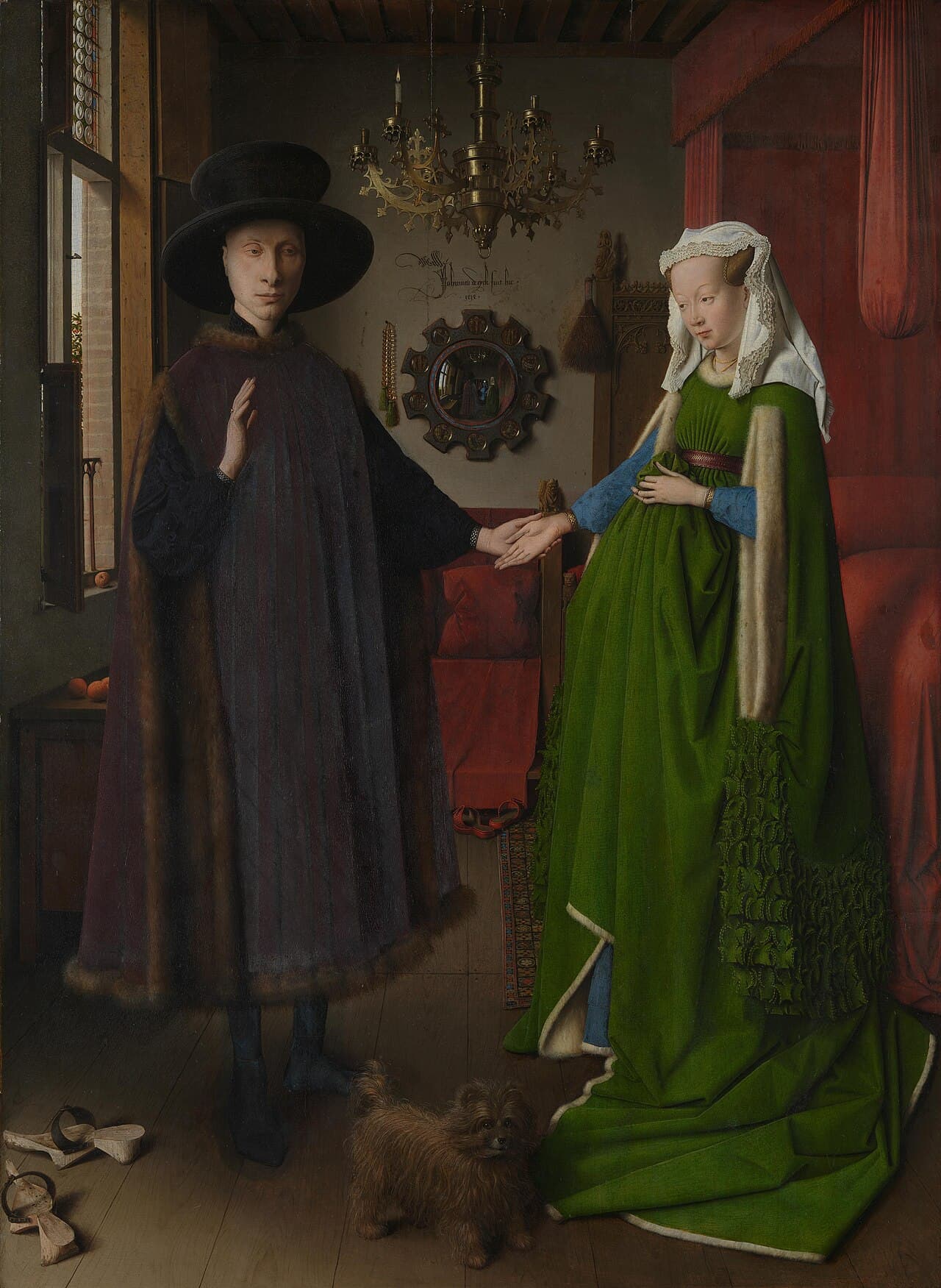 Jan van Eyck's Arnolfini Portrait, showing a man and woman in a domestic interior