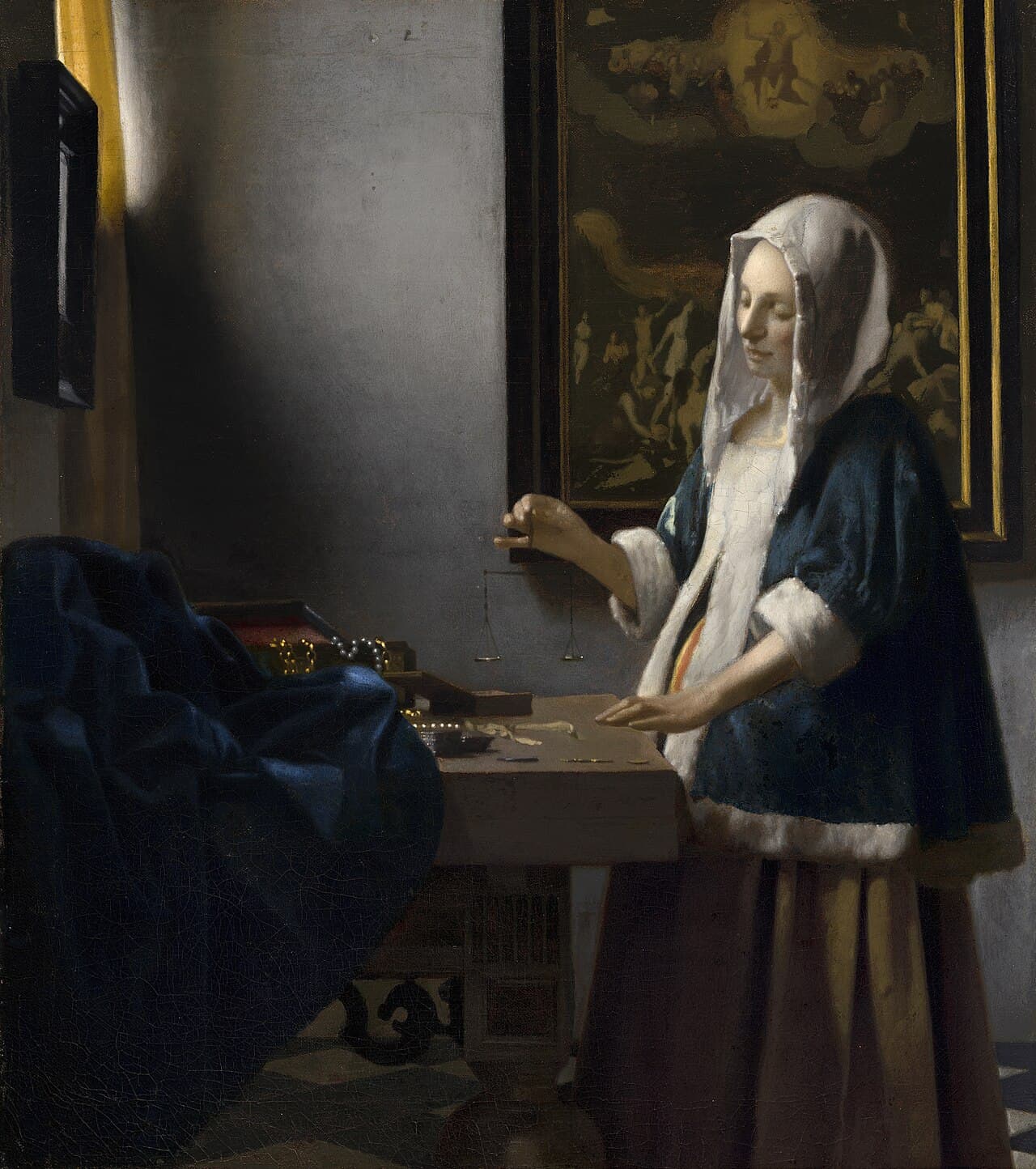 Woman Holding a Balance by Johannes Vermeer, a woman standing before a window holding a scale
